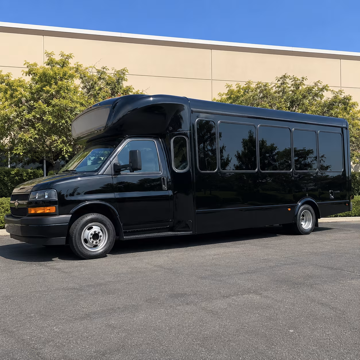 Friends laughing during a Anaheim party bus celebration